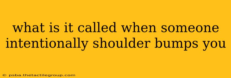 what is it called when someone intentionally shoulder bumps you