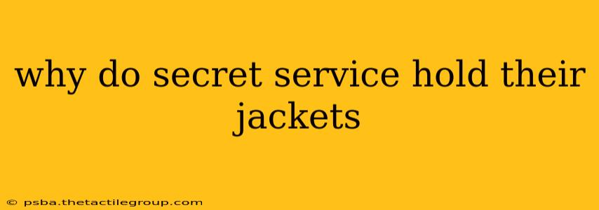 why do secret service hold their jackets